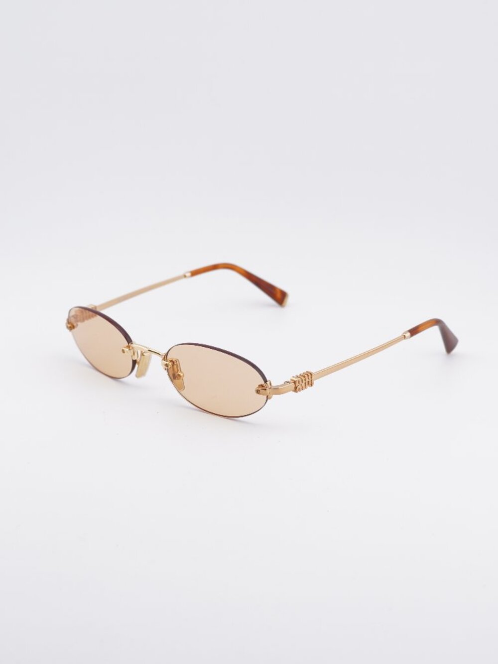 Miu Miu MU A54S 7OE90X Sunglasses Brass Oval Rimless Frame, Orange Lenses